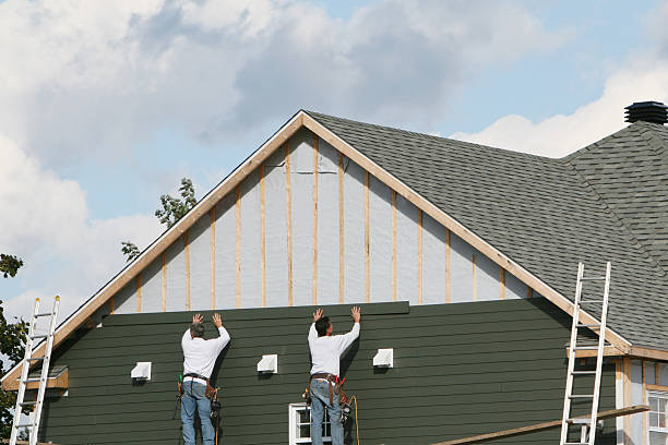 Professional Siding technician working in Kathleen, FL